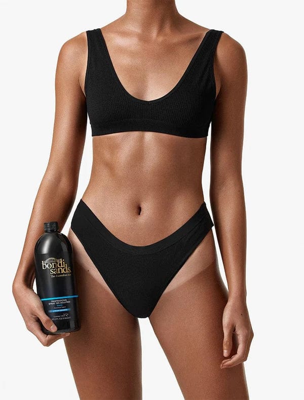 A black 1L (35.2 fl oz) bottle of BondiSandsEU Salon Solution Dark features gold and blue text, a coconut scent, fast-drying 2-hour express formula, dark shade, and “The Australian Tan” label.